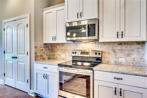 stainless steel cafe appliances white cabinets|cabinet color white appliances.